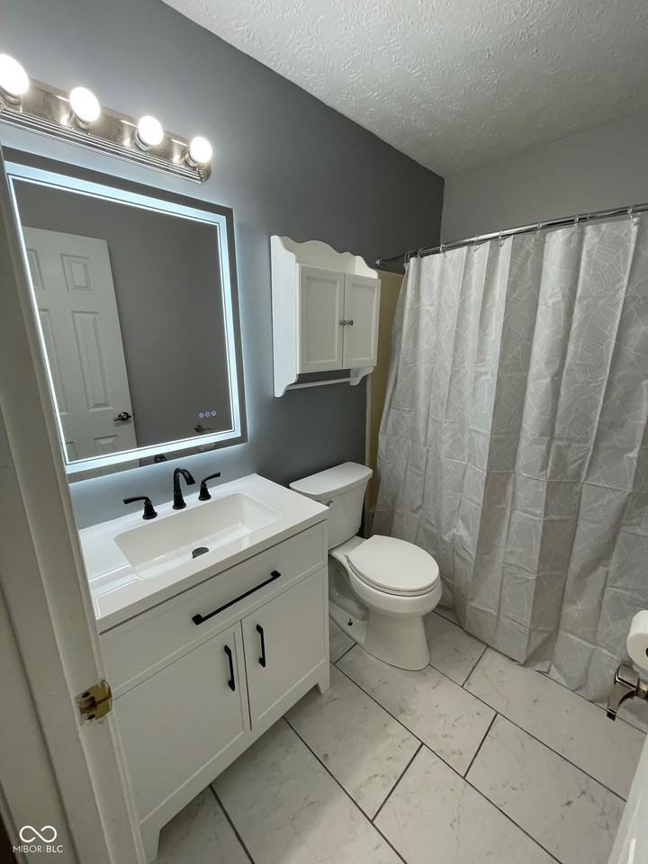 5767 Rosemont Dr - Photo 6 of 15