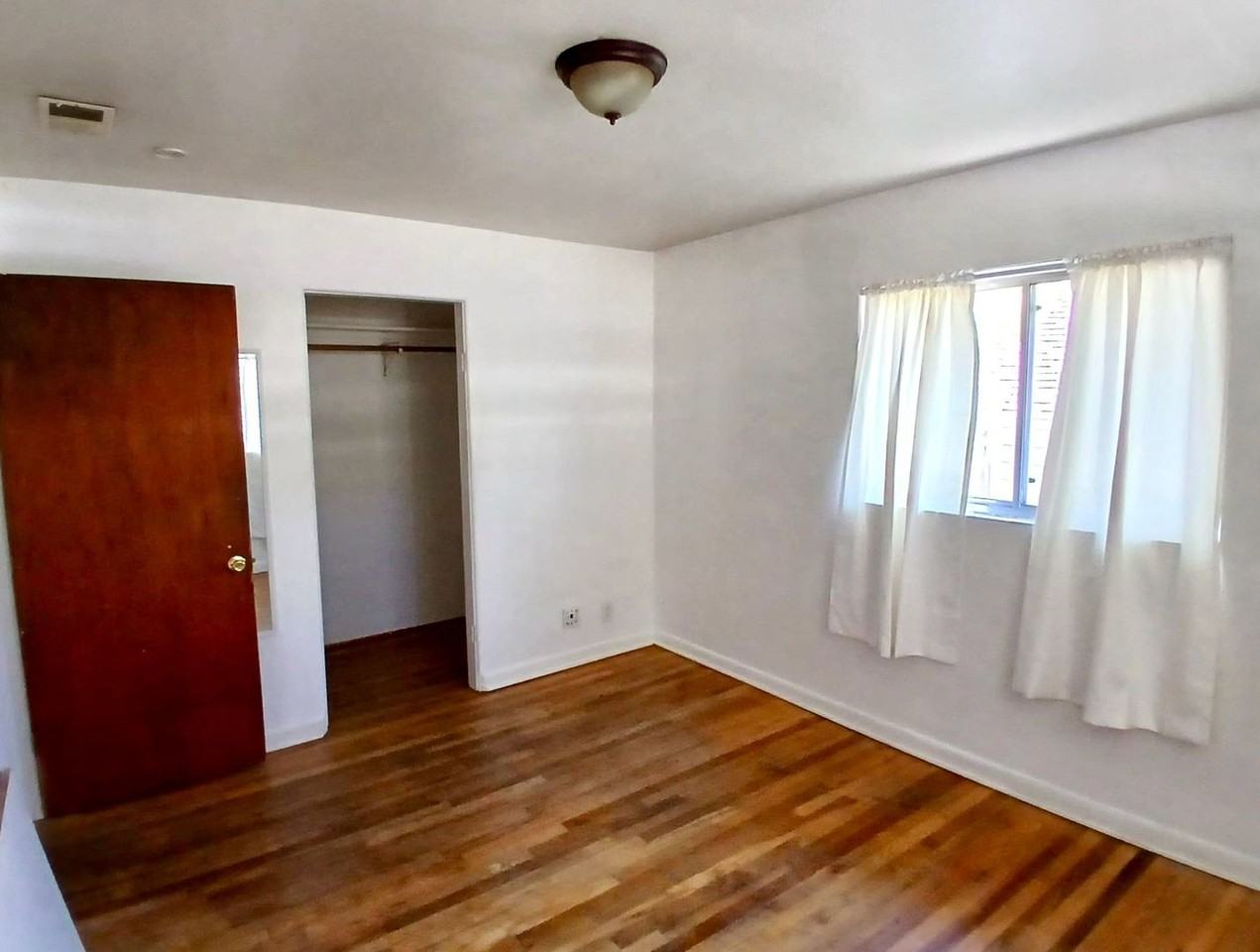 119 Plum Primary Bedroom – Old Town Apartment Near CSU – $850 - Photo 3 of 35