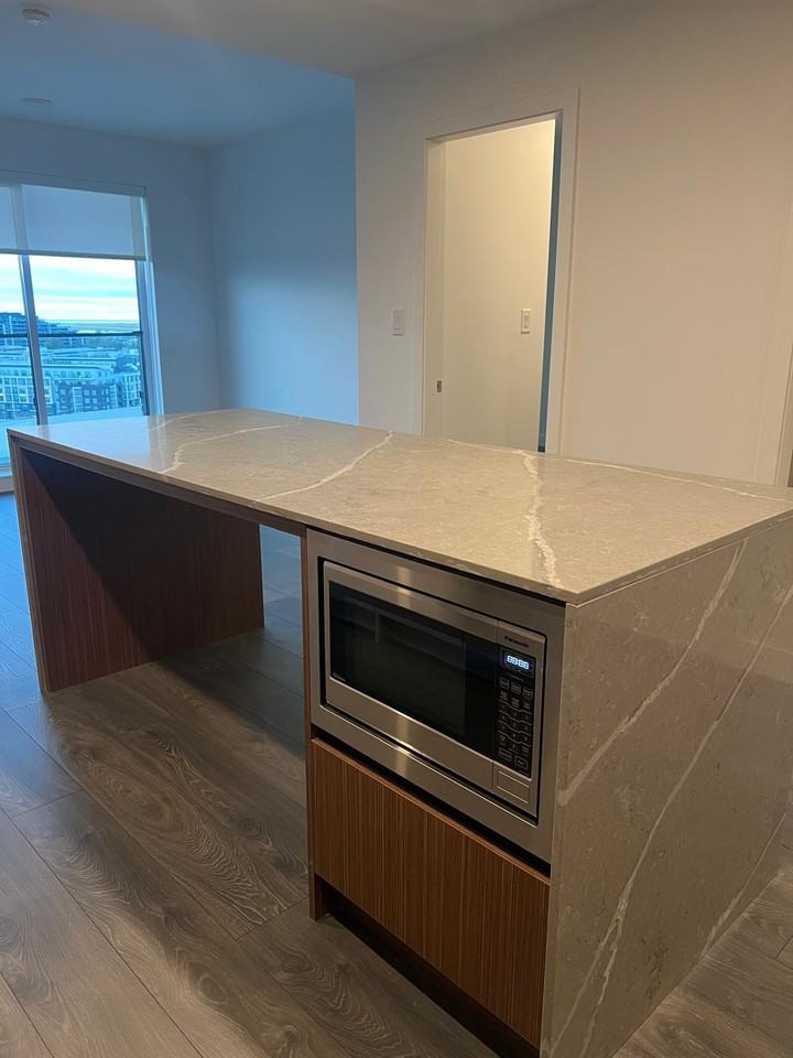 #1506- 5520 McNaughton Road - Photo 2 of 18