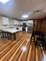 8973 - 405/409 N LEWIS ST (FLYNN BUILDING SUITES) - Photo 1 of 1