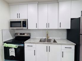 220 Nw 27th Ave #1-4 - Photo 1 of 1
