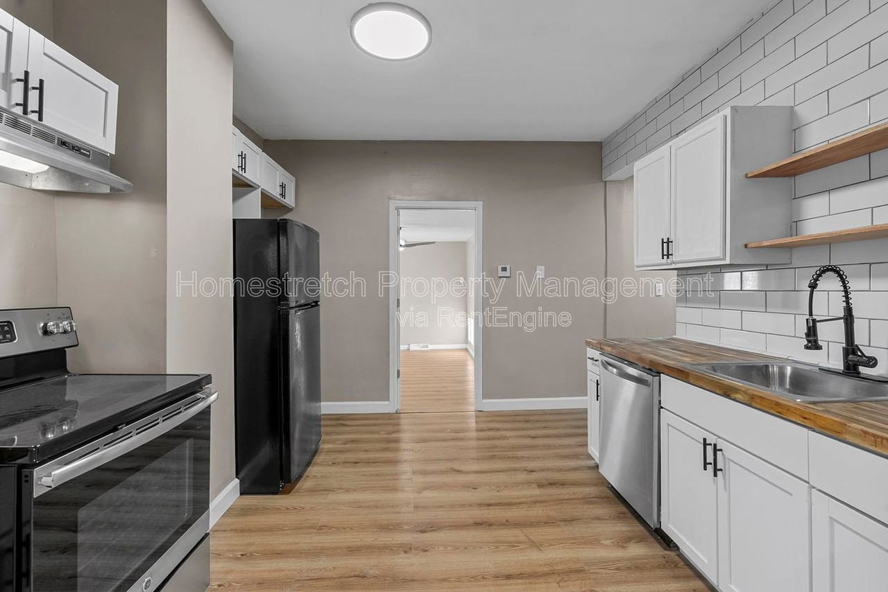 7021 Robbins Ave - Photo 5 of 30