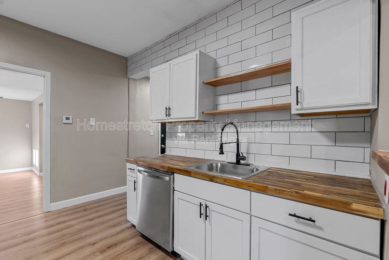 7021 Robbins Ave - Photo 6 of 30