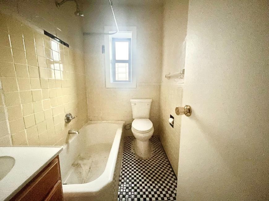 1166 E 215th St - Photo 3 of 5