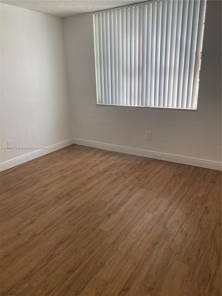 486 Northwest 165th Street #B202 - Photo 7 of 13