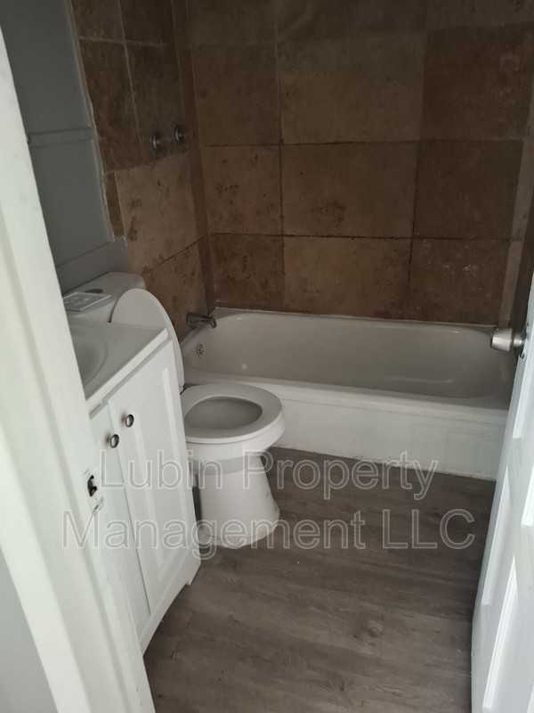 2135 Clifton Ave - Photo 6 of 7