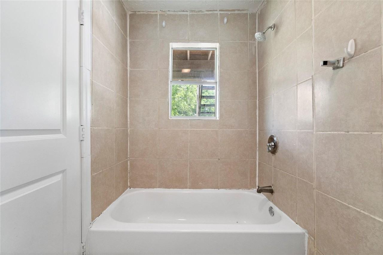 711 AVENUE A - Photo 7 of 8