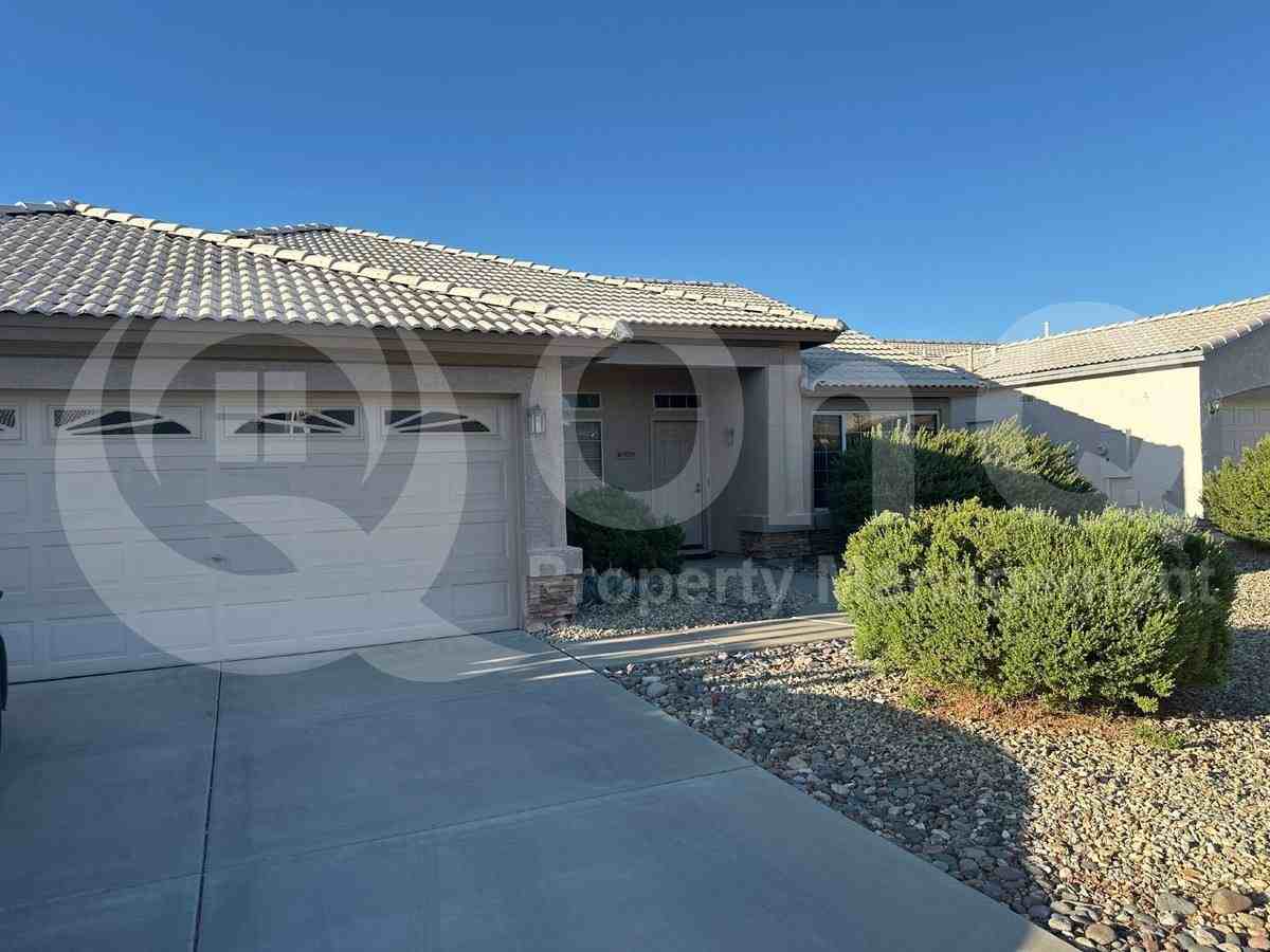 10828 W Utopia Rd - Photo 2 of 10