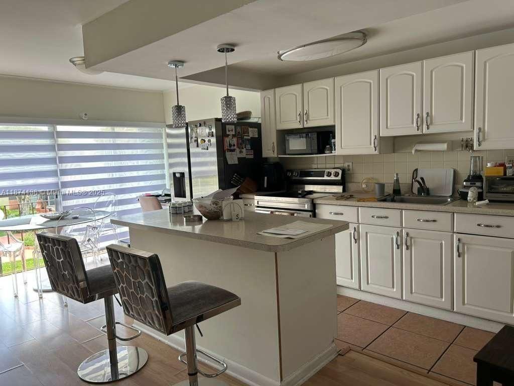 9350 W Flagler St - Photo 2 of 3