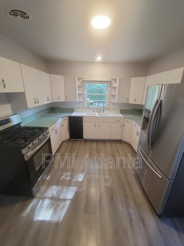 1952 Wellbourne Dr Ne - Photo 5 of 13