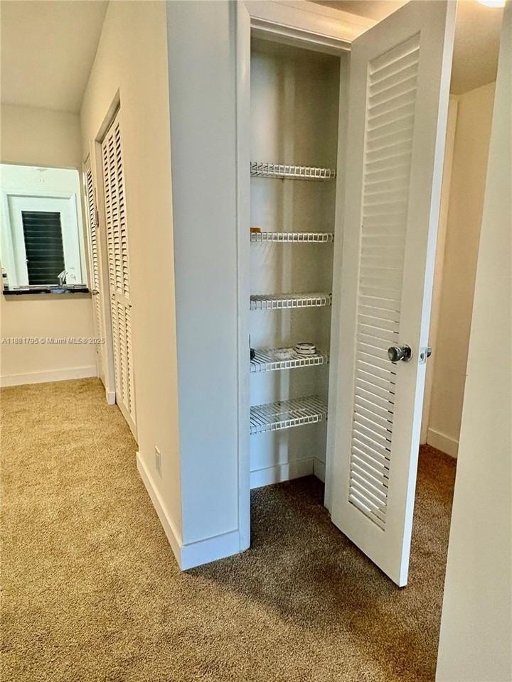 300 Golden Isles Dr #317 - Photo 4 of 8