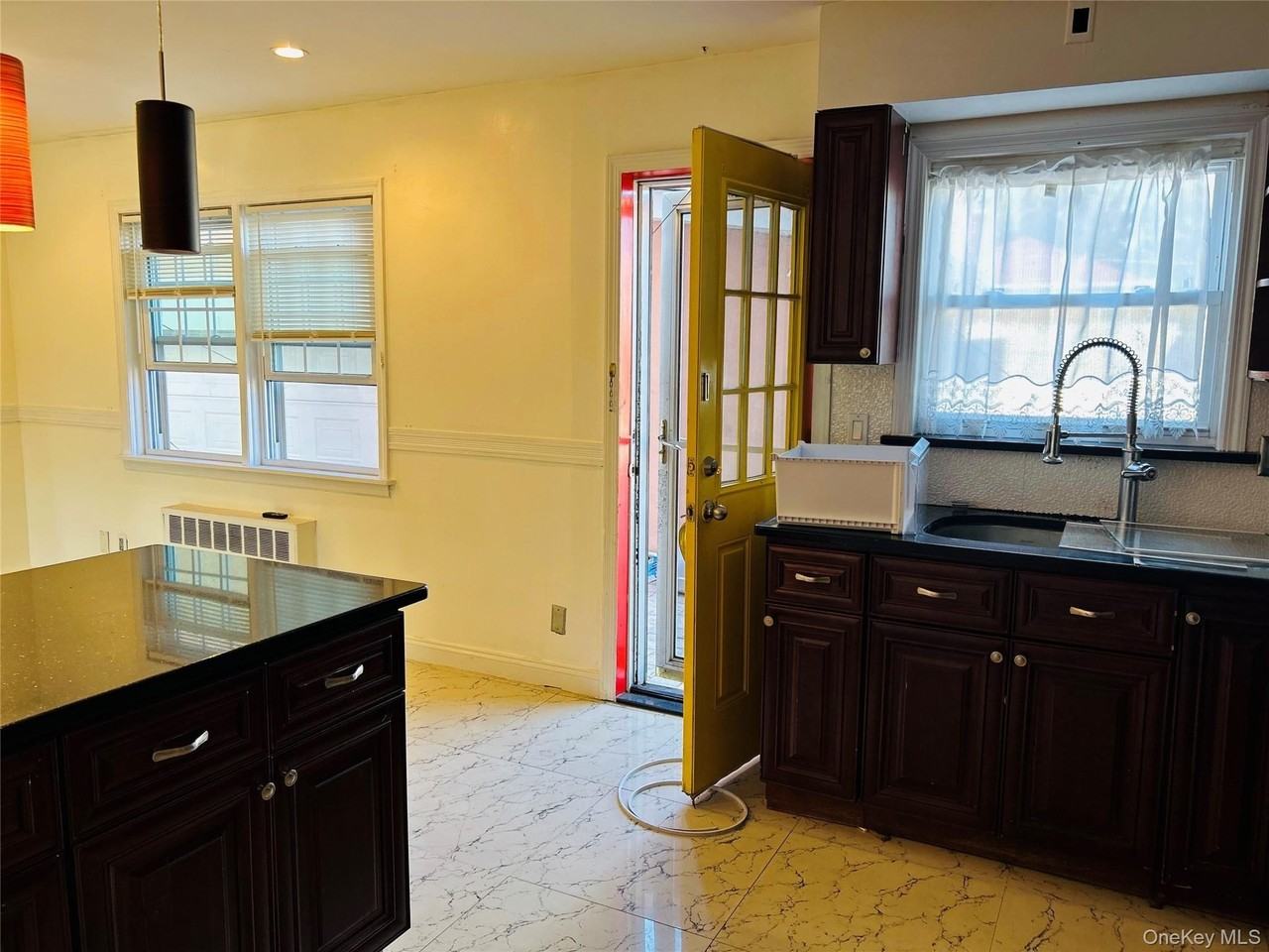 8607 Little Neck Pkwy - Photo 2 of 21