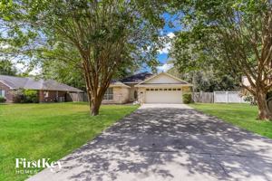 featured image of 7122 Woodland Oaks