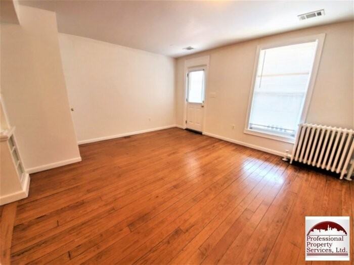 115 E 6th St - Photo 3 of 32
