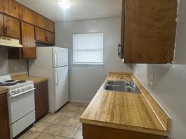 featured image of E 11th St