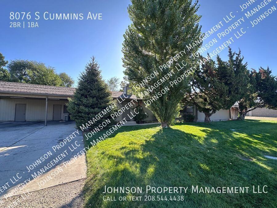 8076 S Cummins Ave - Photo 2 of 14