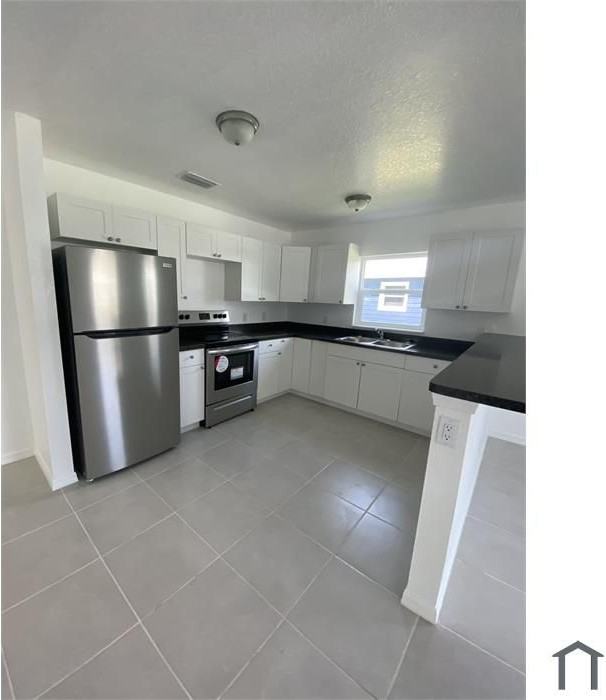 809 11th St E - Photo 3 of 17