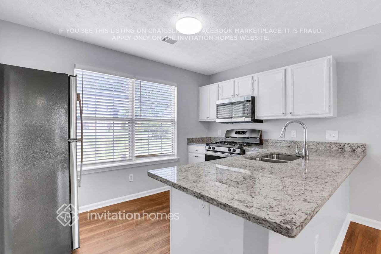 5257 Windfield Glen Ct Nw - Photo 5 of 23