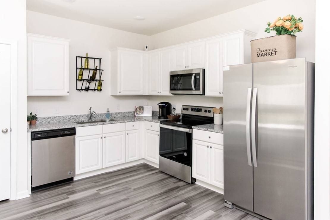 Covey Homes Wescott - Photo 2 of 14