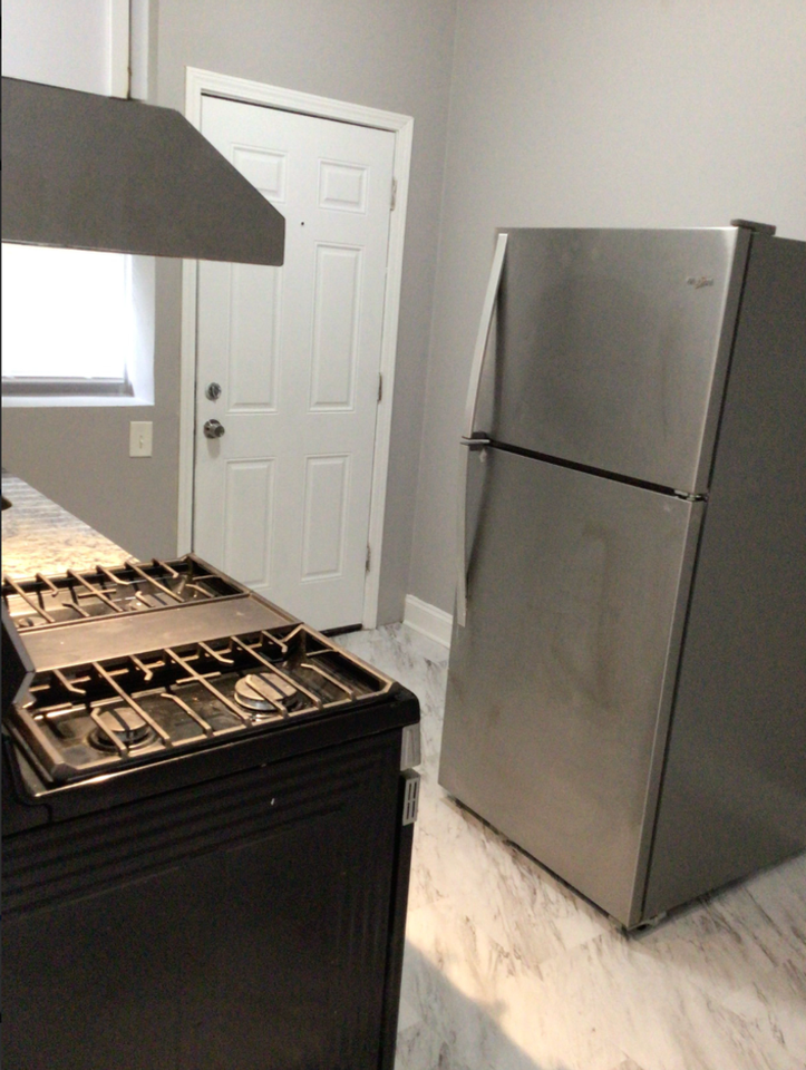 1136 W 68th St - Photo 3 of 7