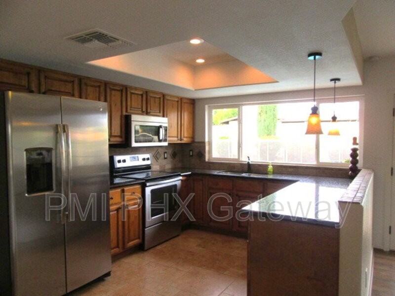 5312 E Gelding Dr - Photo 5 of 9