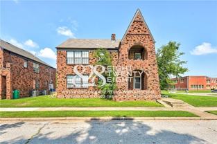 1413-1415 1413-1415 N. Youngs Blvd. - 2300 NW 14th St. - Photo 1 of 1