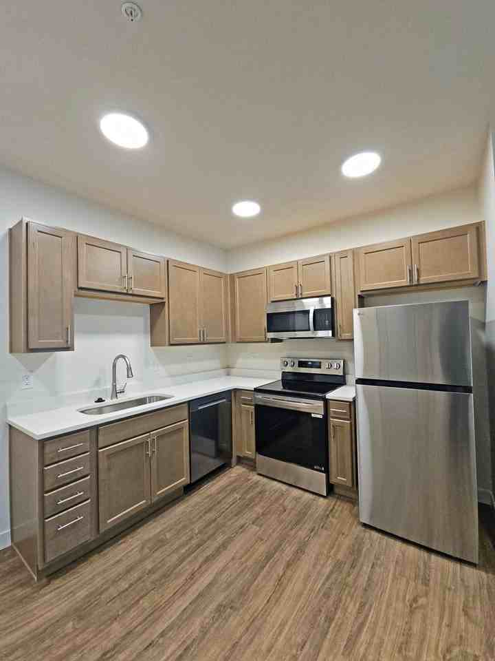 Escher Apartments - Photo 5 of 50