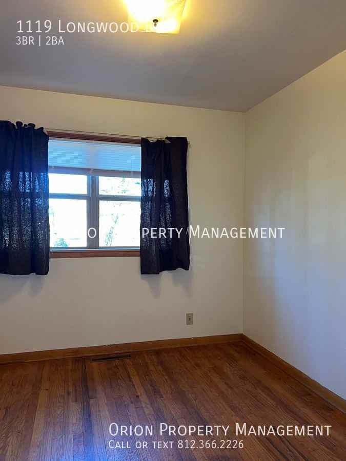 1119 S Longwood Dr - Photo 7 of 13