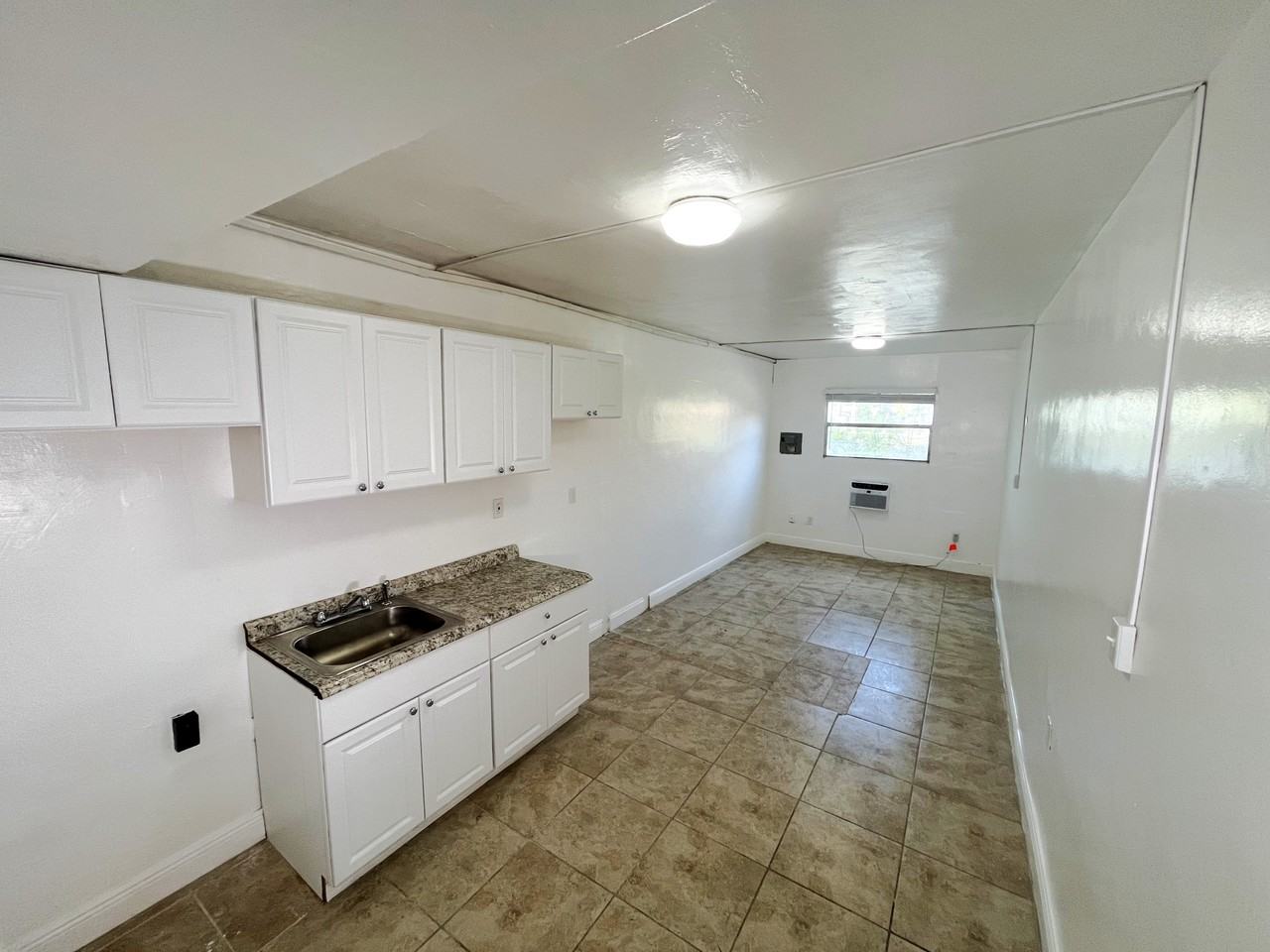 THE MONTERREY APARTMENTS LLC - Photo 2 of 4