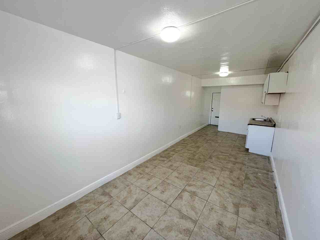 THE MONTERREY APARTMENTS LLC - Photo 3 of 4