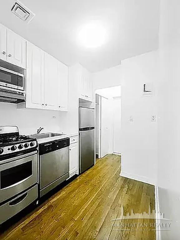 E 36th St #3G - Photo 2 of 4