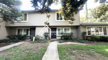 featured image of 8736 Woodman Way