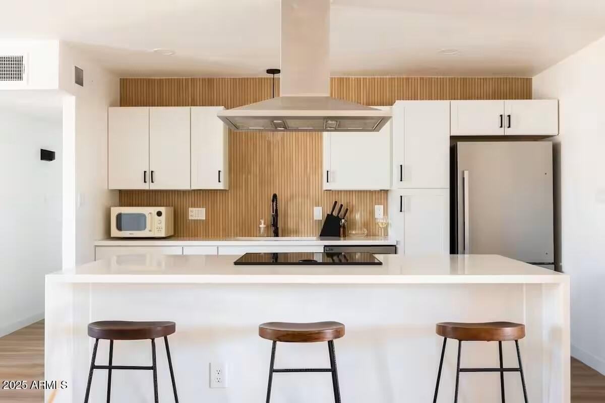 8447 E Vernon Ave - Photo 3 of 22