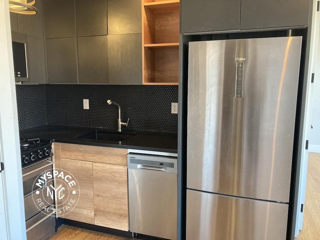 217 Malcolm X Blvd #3C - Photo 2 of 9