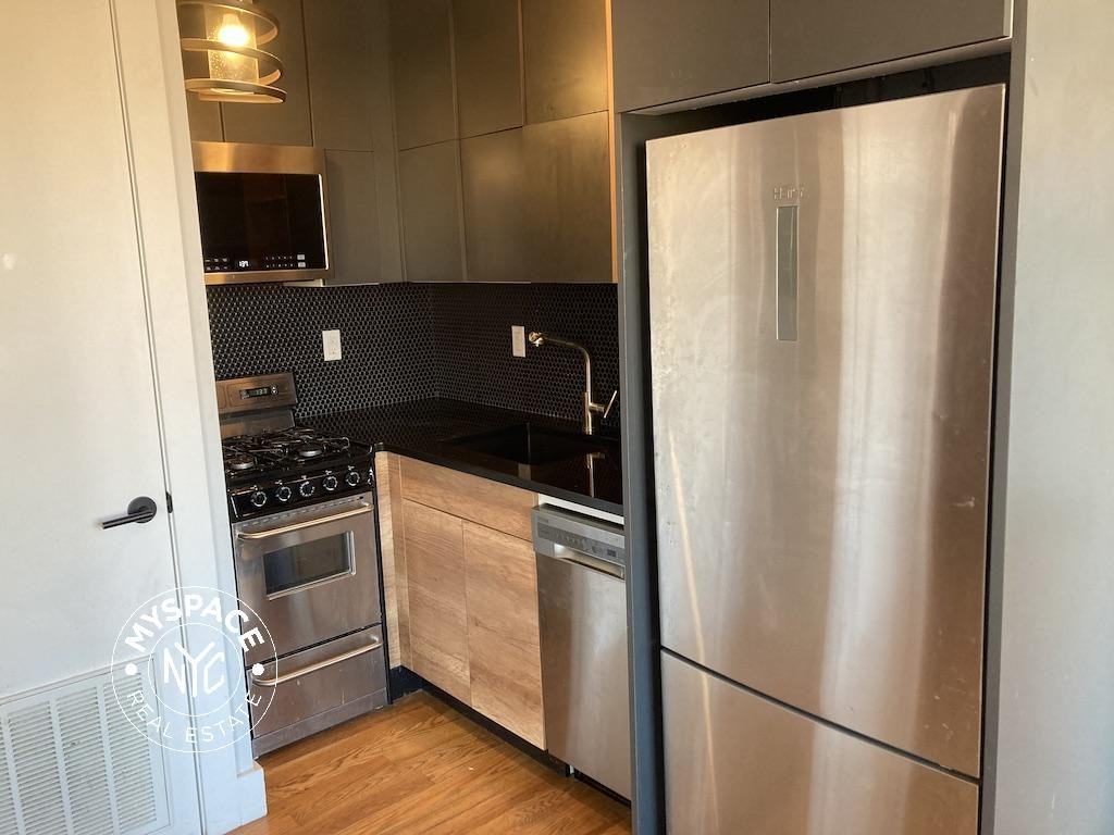 217 Malcolm X Blvd #3C - Photo 3 of 9