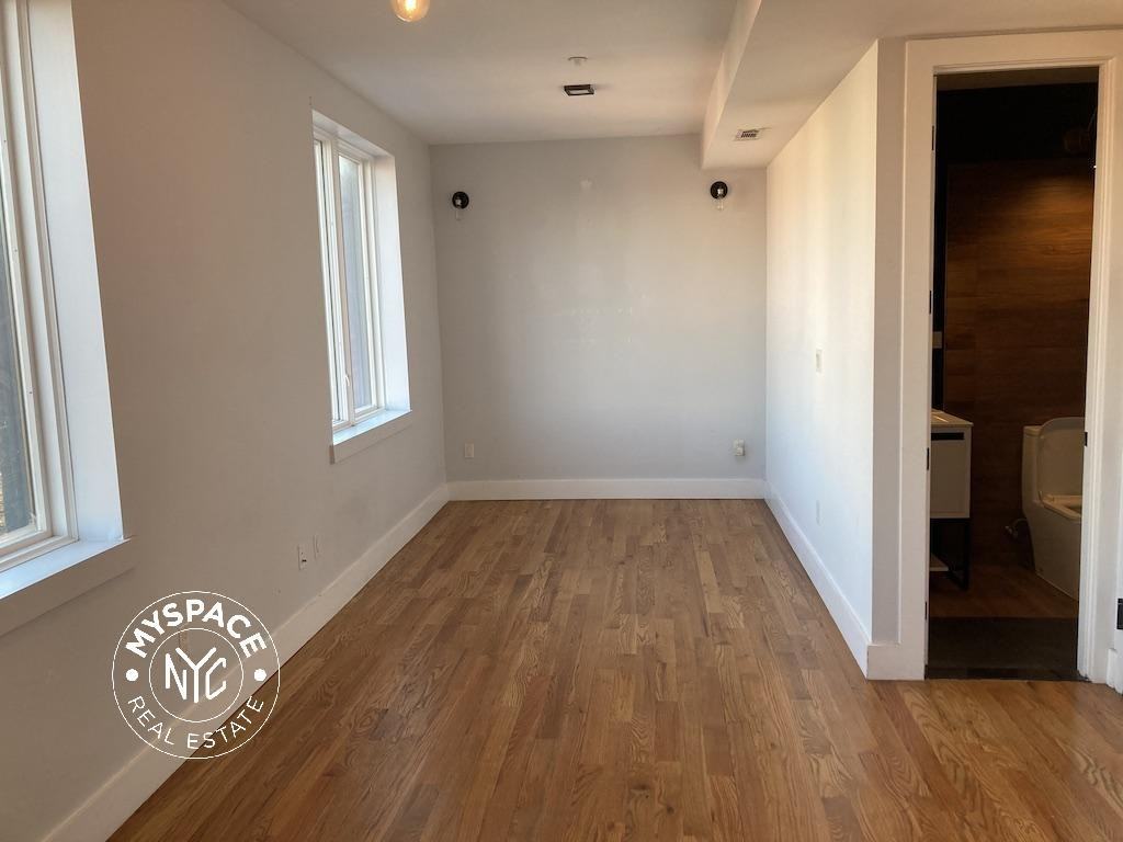 217 Malcolm X Blvd #3C - Photo 4 of 9