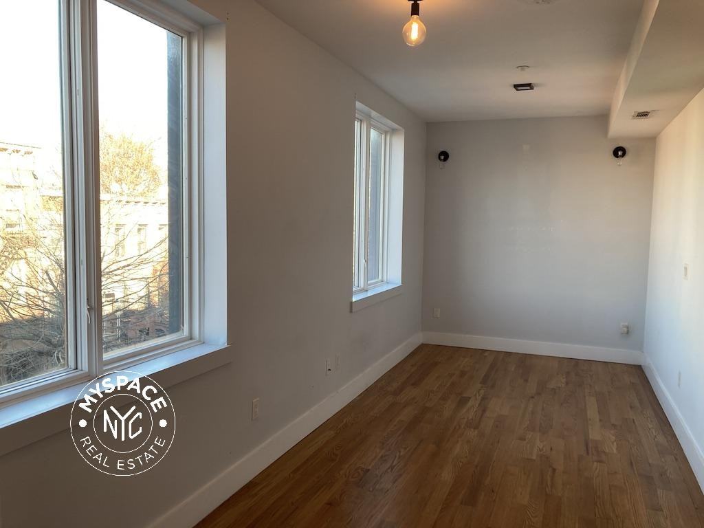 217 Malcolm X Blvd #3C - Photo 5 of 9