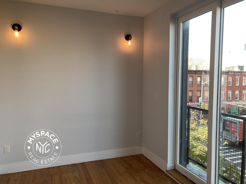 217 Malcolm X Blvd #3C - Photo 6 of 9