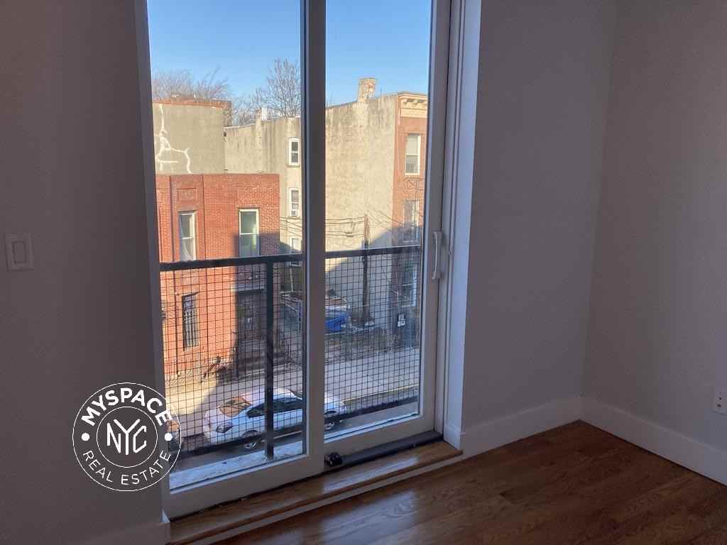 217 Malcolm X Blvd #3C - Photo 7 of 9