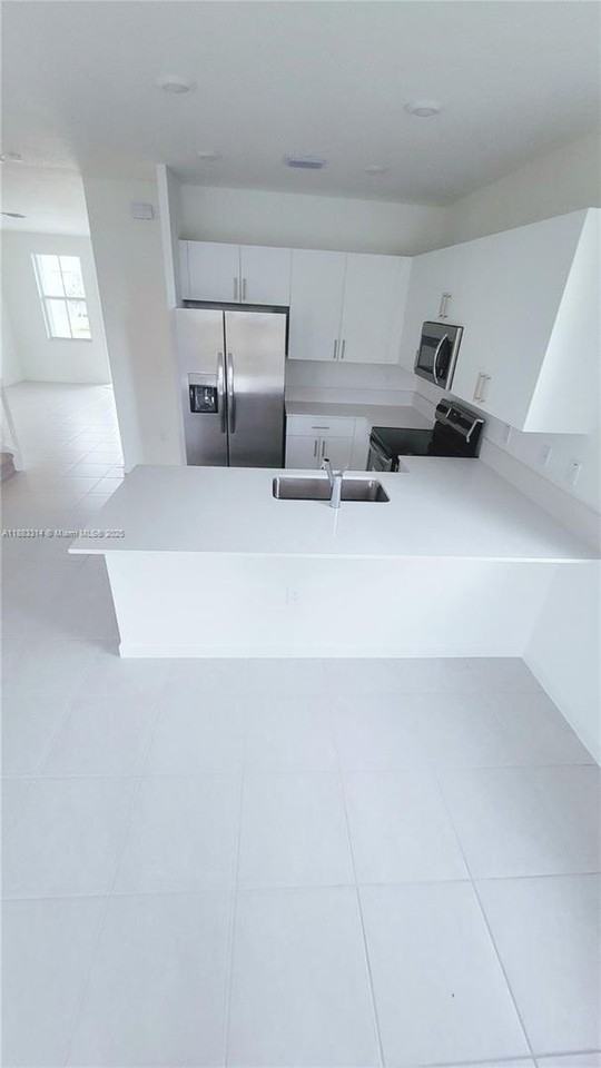 12010 Nw 47th Mnr - Photo 2 of 13