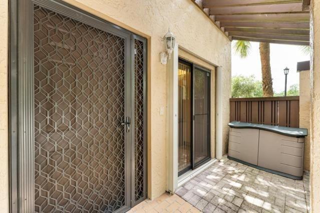 3960 Cocoplum Cir - Photo 3 of 20