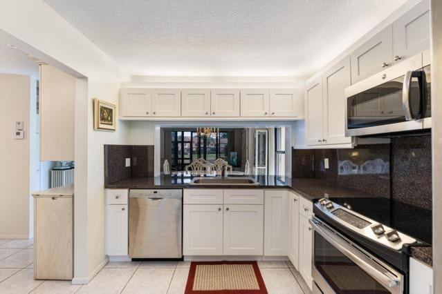 3960 Cocoplum Cir - Photo 5 of 20