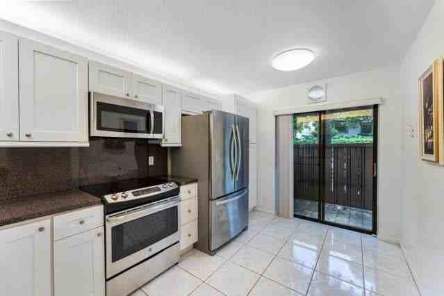 3960 Cocoplum Cir - Photo 6 of 20