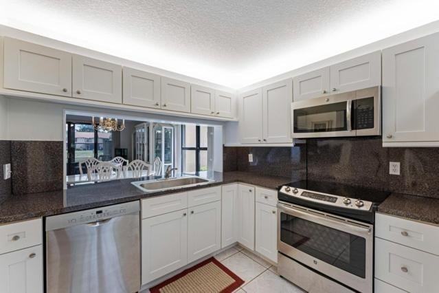 3960 Cocoplum Cir - Photo 7 of 20