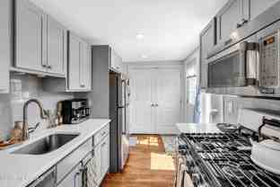 217 217 Jersey Avenue unit: Rear Annual - Photo 1 of 1