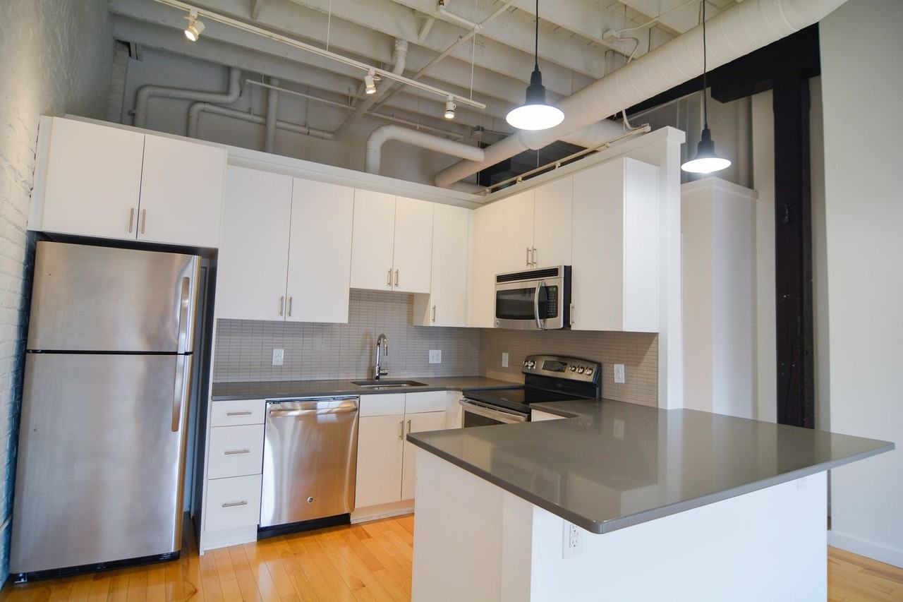 Meyer Raapke Fllats - Photo 5 of 6