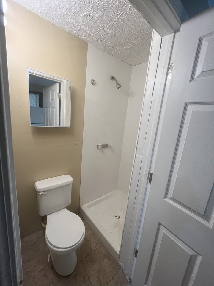 1065 W 33rd St - Photo 2 of 48