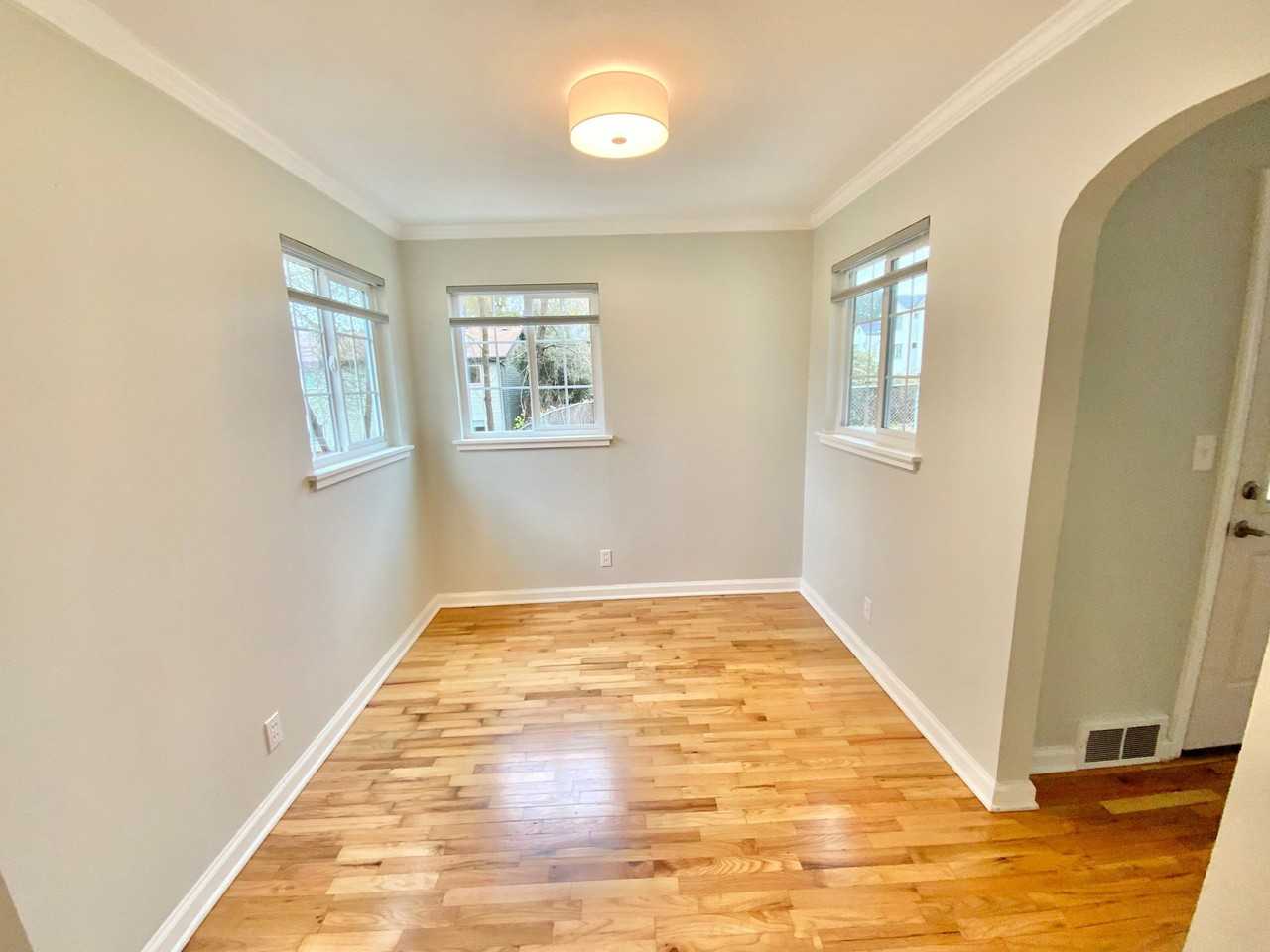 Beautiful Townhouse with Fenced Yard, Garage, and AC - Photo 6 of 24