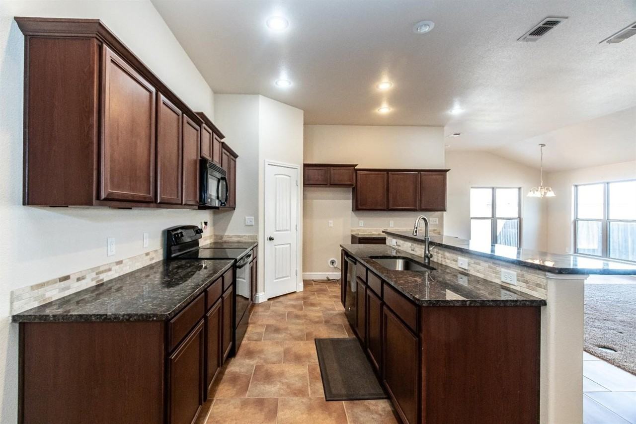 9706 Ridgely Ave - Photo 3 of 36