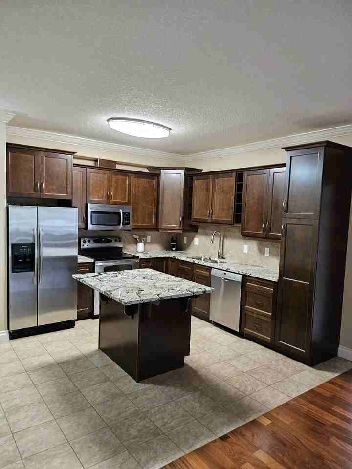 Executive University Area Condo Rental - Photo 3 of 17